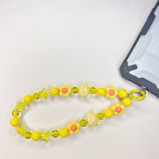 SUNNY BEAR BLOOM PHONE CHARM